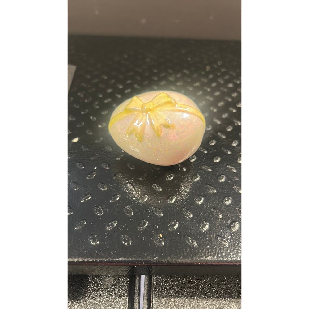 1403. Ceramic egg with yellow bow